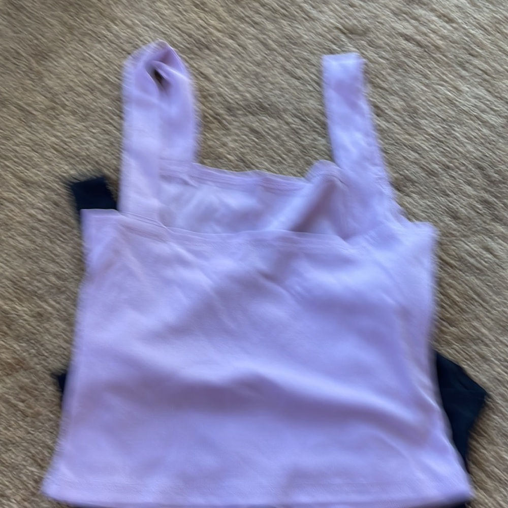 NEW size large but runs more like medium, and a body suit size small. Lot of 4 - Picture 6 of 9